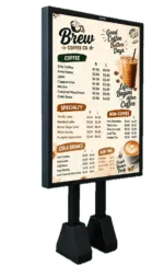Outdoor standing menu board for Brew Coffee Co. displaying drink categories and prices with a coffee cup graphic on the side.