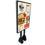 A large restaurant menu board on a double-legged stand showing burgers, pizzas, and desserts.
