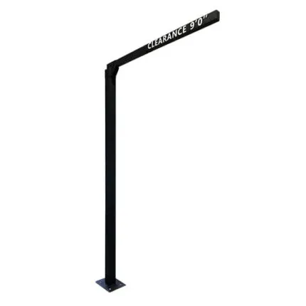 Black overhead clearance bar sign reading "CLEARANCE 9'0" mounted on a pole for drive-thru height warning.