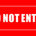 Red directional sign reading "DO NOT ENTER" in white text.