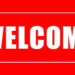 Letrero direccional rojo que dice "BIENVENIDO."