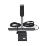Vehicle detector system with a tall post-mounted sensor, a horizontal ground loop bar with coiled cable, and a black control box with power, visitor, and low battery indicator lights.