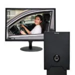 Drive-thru order station monitor showing a live feed of a woman driving, next to a black Avio-branded camera and intercom unit.