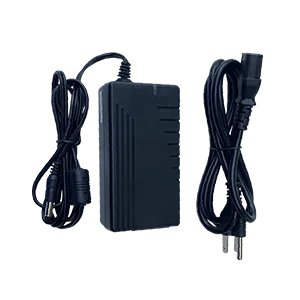 Black power adapter with coiled input and output cables and plugs.